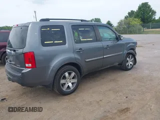 2013 Honda Pilot Touring with VIN 5FNYF3H9XDB024500, listed as a IAAI auction lot 42683695 with 151,441 mi miles and . Bid and sale history available at DreamBid. Image 4.