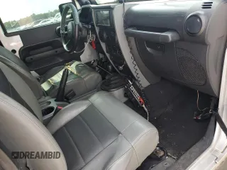 2008 Jeep Wrangler X z VIN 1J4FA24168L549082, wystawiony jako Copart lot #58178805 z przebiegiem 150 606 mil mil oraz Szkoda całkowita • Salvage title. Historia ofert i sprzedaży dostępna na DreamBid. Obrazek 8.