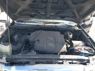 2010 Toyota Tacoma PreRunner with VIN 3TMJU4GN6AM099990, listed as a IAAI auction lot 41530022 with 193,139 mi miles and . Bid and sale history available at DreamBid. Image 10.