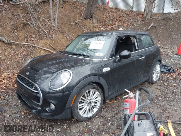 2019 MINI Hardtop Cooper S z VIN WMWXP7C54K2A53043, wystawiony jako IAAI lot #41794566 z przebiegiem 42 278 mil mil oraz . Historia ofert i sprzedaży dostępna na DreamBid. Obrazek 23.