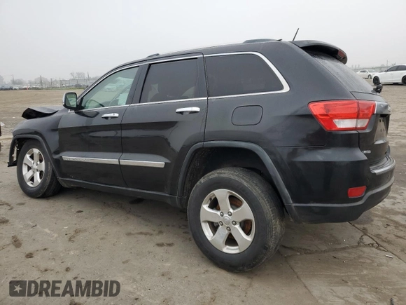 2013 Jeep Grand Cherokee Limited with VIN 1C4RJEBG5DC657005, listed as a Copart auction lot 84101024 with 124,055 mi miles and Salvage Title. Bid and sale history available at carsss.com. Image 2.