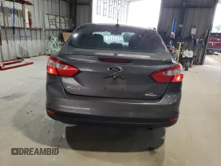 2012 Ford Focus SE z VIN 1FAHP3F28CL444261, wystawiony jako Copart lot #61174145 z przebiegiem 77 612 mil mil oraz Szkoda całkowita • Salvage title. Historia ofert i sprzedaży dostępna na DreamBid. Obrazek 6.