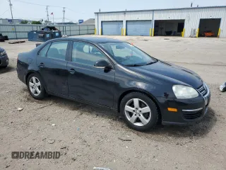 2009 Volkswagen Jetta S with VIN 3VWJM71K69M154382, listed as a Copart auction lot 60513215 with 193,278 mi miles and Salvage title. Bid and sale history available at DreamBid. Image 4.