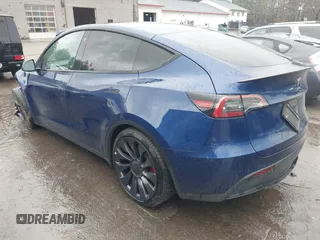 2021 Tesla Model Y Performance with VIN 5YJYGDEF5MF257262, listed as a IAAI auction lot 41721311 with 31,329 mi miles and . Bid and sale history available at DreamBid. Image 3.
