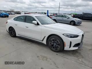 2024 BMW i4 eDrive35 with VIN WBY43AW08RFS83004, listed as a Copart auction lot 50818335 with 12,000 mi miles and Salvage Title. Bid and sale history available at carsss.com. Image 4.