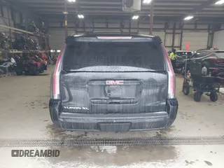 2015 GMC Yukon XL SLT with VIN 1GKS2HKC9FR175011, listed as a IAAI auction lot 41510519 with 194,136 mi miles. Bid and sale history available at carsss.com. Image 16.