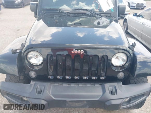 2015 Jeep Wrangler Unlimited Sahara with VIN 1C4HJWEG6FL572674, listed as a IAAI auction lot 42736266 with 97,024 mi miles and . Bid and sale history available at DreamBid. Image 6.