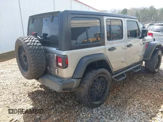 2020 Jeep Wrangler Unlimited Sport Altitude с VIN 1C4HJXDN8LW127059, выставлен на аукционе IAAI как лот 41821194 с пробегом 152 744 миль миль и . История ставок и продаж доступна на DreamBid. Изображение 4.