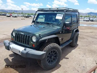 2012 Jeep Wrangler Sahara z VIN 1C4AJWBGXCL100527, wystawiony jako IAAI lot #42394623 z przebiegiem 126 097 mil mil oraz . Historia ofert i sprzedaży dostępna na DreamBid. Obrazek 17.