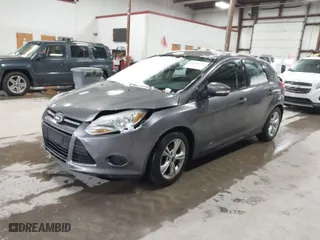 2014 Ford Focus SE with VIN 1FADP3K21EL207666, listed as a IAAI auction lot 41846327 with 148,293 mi miles. Bid and sale history available at carsss.com. Image 2.