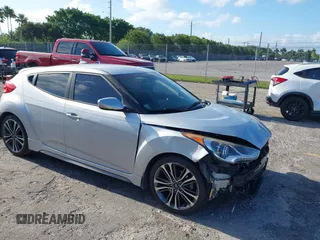 2016 Hyundai Veloster Turbo with VIN KMHTC6AE4GU303847, listed as a IAAI auction lot 42113605 with 130,416 mi miles and . Bid and sale history available at DreamBid. Image 1.