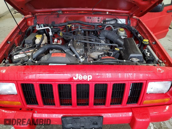 1998 Jeep Cherokee Sport with VIN 1J4FJ68S7WL148034, listed as a Copart auction lot 52436475 with 80,239 mi miles and Salvage Title. Bid and sale history available at carsss.com. Image 12.