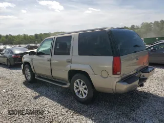 1999 Cadillac Escalade z VIN 1GYEK13RXXR408201, wystawiony jako Copart lot #53805845 z przebiegiem 268 205 mil mil oraz Szkoda całkowita • Salvage title. Historia ofert i sprzedaży dostępna na DreamBid. Obrazek 2.