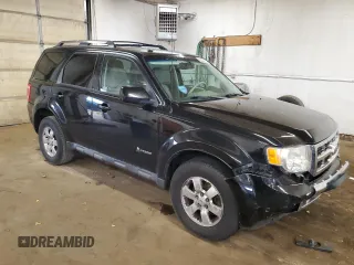 2010 Ford Escape Hybrid with VIN 1FMCU4K30AKC25228, listed as a Copart auction lot 60322835 with 207,629 mi miles and Salvage title. Bid and sale history available at DreamBid. Image 4.