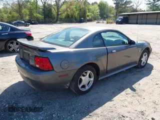 2004 Ford Mustang Standard z VIN 1FAFP40644F236905, wystawiony jako IAAI lot #42016081 z przebiegiem 167 733 mil mil oraz . Historia ofert i sprzedaży dostępna na DreamBid. Obrazek 4.