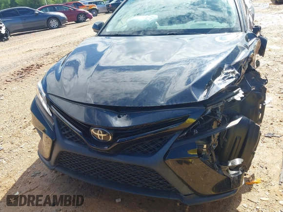 2018 Toyota Camry LE z VIN 4T1B11HKXJU652275, wystawiony jako IAAI lot #42245625 z przebiegiem 49 596 mil mil oraz . Historia ofert i sprzedaży dostępna na DreamBid. Obrazek 12.
