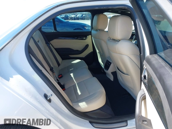 2017 Cadillac CTS Luxury RWD with VIN 1G6AR5SS7H0145637, listed as a IAAI auction lot 41689827 with 54,576 mi miles and . Bid and sale history available at DreamBid. Image 8.