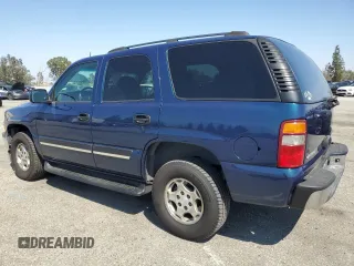 2005 Chevrolet Tahoe LS with VIN 1GNEC13V75R173583, listed as a Copart auction lot 59998015 with 164,575 mi miles and Salvage title. Bid and sale history available at DreamBid. Image 2.
