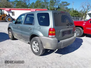 2007 Ford Escape XLT with VIN 1FMYU03Z07KA20616, listed as a IAAI auction lot 41567658 with 142,907 mi miles. Bid and sale history available at carsss.com. Image 3.