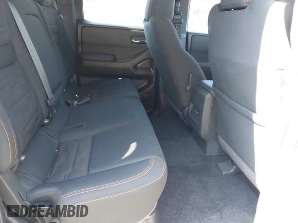 2023 Nissan Frontier Pro-4X z VIN 1N6ED1EKXPN641323, wystawiony jako IAAI lot #42227180 z przebiegiem 25 199 mil mil oraz . Historia ofert i sprzedaży dostępna na DreamBid. Obrazek 8.