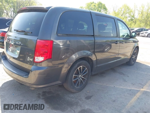 2016 Dodge Grand Caravan SE with VIN 2C4RDGBG9GR155175, listed as a IAAI auction lot 42086472 with 267,292 mi miles and . Bid and sale history available at DreamBid. Image 4.
