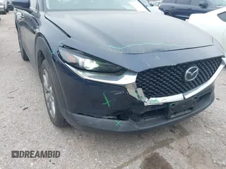 2023 Mazda CX-30 S Carbon Edition with VIN 3MVDMBCM1PM520066, listed as a IAAI auction lot 41877916 with 22,973 mi miles and . Bid and sale history available at carsss.com. Image 6.