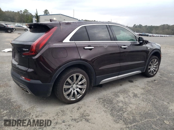 2020 Cadillac XT4 FWD Premium Luxury with VIN 1GYFZCR42LF149030, listed as a Copart auction lot 82671894 with 88,570 mi miles and Salvage title. Bid and sale history available at DreamBid. Image 3.