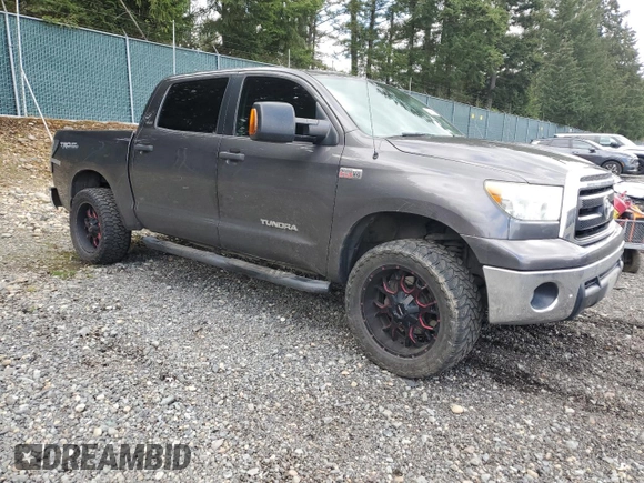 2012 Toyota Tundra 4WD Truck with VIN 5TFDY5F13CX263098, listed as a Copart auction lot 53458655 with 203,332 mi miles and Salvage Title. Bid and sale history available at carsss.com. Image 4.