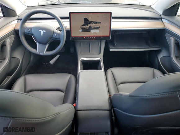 2023 Tesla Model 3 with VIN 5YJ3E1EA7PF579683, listed as a Copart auction lot 87651765 with 9,048 mi miles and Salvage Title. Bid and sale history available at carsss.com. Image 8.