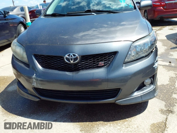 2010 Toyota Corolla with VIN 2T1BU4EEXAC463697, listed as a IAAI auction lot 42099807 with 206,160 mi miles. Bid and sale history available at carsss.com. Image 6.