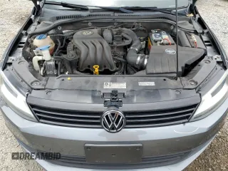 2014 Volkswagen Jetta S with VIN 3VW2K7AJ8EM231099, listed as a Copart auction lot 65752605 with 143,010 mi miles and Salvage title. Bid and sale history available at DreamBid. Image 11.