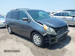 2010 Honda Odyssey EX-L z VIN 5FNRL3H70AB095180, wystawiony jako IAAI lot #42605072 z przebiegiem 178 518 mil mil oraz . Historia ofert i sprzedaży dostępna na DreamBid. Obrazek 1.