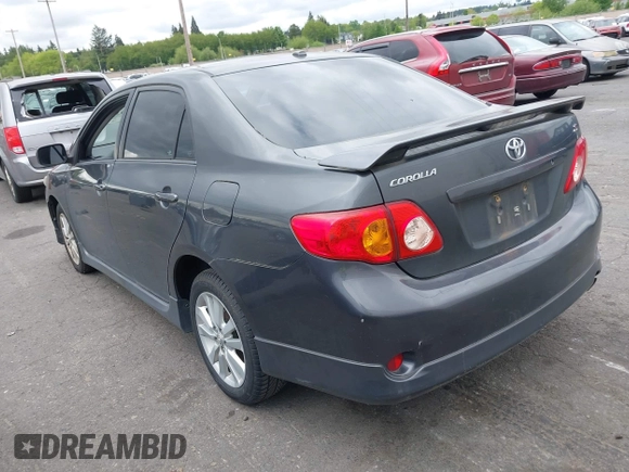 2009 Toyota Corolla with VIN 1NXBU40E39Z065572, listed as a IAAI auction lot 42138980 with 195,822 mi miles. Bid and sale history available at carsss.com. Image 3.