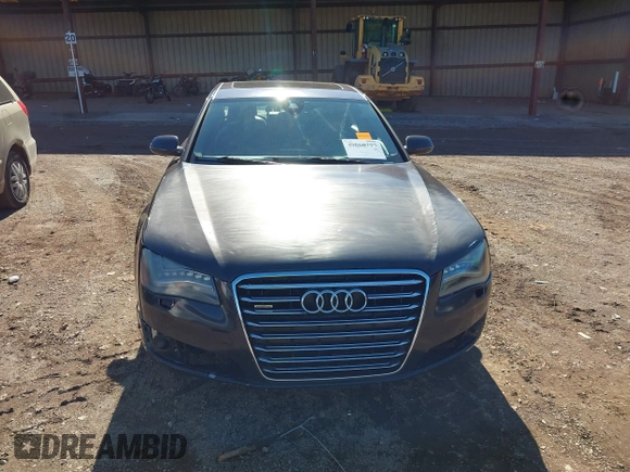 2011 Audi A8 with VIN WAURVAFDXBN014290, listed as a IAAI auction lot 40860777 with 152,584 mi miles and . Bid and sale history available at DreamBid. Image 12.