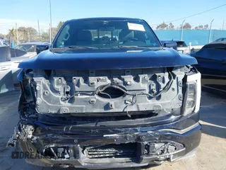 2022 Ford F-150 Lightning Pro z VIN 1FT6W1EV8NWG04113, wystawiony jako IAAI lot #41765532 z przebiegiem 48 990 mil mil oraz . Historia ofert i sprzedaży dostępna na DreamBid. Obrazek 12.