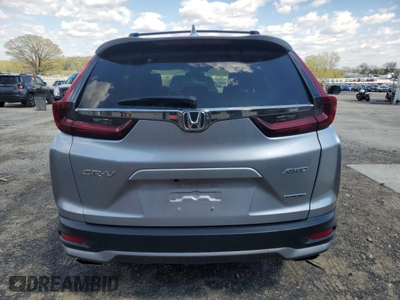 2020 Honda CR-V Touring z VIN 2HKRW2H95LH650860, wystawiony jako Copart lot #55510015 z przebiegiem 68 680 mil mil oraz Szkoda całkowita • Salvage title. Historia ofert i sprzedaży dostępna na DreamBid. Obrazek 6.