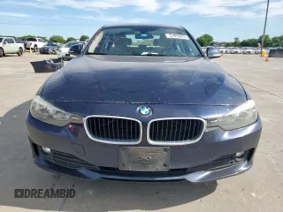 2015 BMW 3 Series 320i with VIN WBA3B1C58FK140327, listed as a Copart auction lot 57999675 with 124,437 mi miles and Salvage title. Bid and sale history available at DreamBid. Image 5.