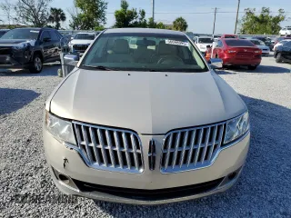 2010 Lincoln MKZ z VIN 3LNHL2GC8AR644901, wystawiony jako Copart lot #56098095 z przebiegiem 165 989 mil mil oraz Nie do naprawy • Non repairable. Historia ofert i sprzedaży dostępna na DreamBid. Obrazek 5.