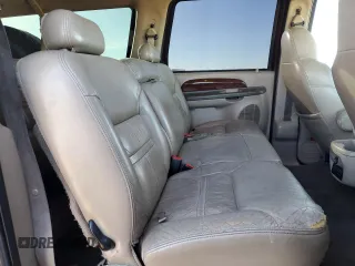 2001 Ford Excursion Limited z VIN 1FMNU42S41EA08926, wystawiony jako Copart lot #86759004 z przebiegiem 163 271 mil mil oraz Czysty tytuł • Clean title. Historia ofert i sprzedaży dostępna na DreamBid. Obrazek 11.
