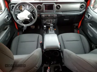 2023 Jeep Gladiator Sport S with VIN 1C6HJTAG6PL584451, listed as a Copart auction lot 47637395 with 8,356 mi miles and Salvage title. Bid and sale history available at DreamBid. Image 8.