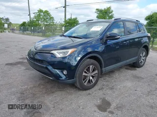 2018 Toyota RAV4 XLE with VIN JTMWFREV9JJ165655, listed as a IAAI auction lot 42138998 with 123,569 mi miles and . Bid and sale history available at carsss.com. Image 17.