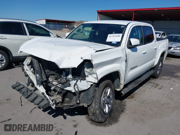 2018 Toyota Tacoma SR5 with VIN 5TFAZ5CN4JX056465, listed as a IAAI auction lot 41767848 with 71,532 mi miles and . Bid and sale history available at DreamBid. Image 20.
