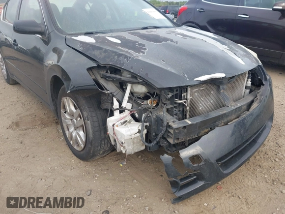 2012 Nissan Altima S with VIN 1N4AL2AP0CC214563, listed as a IAAI auction lot 41951893 with 228,291 mi miles and . Bid and sale history available at carsss.com. Image 6.