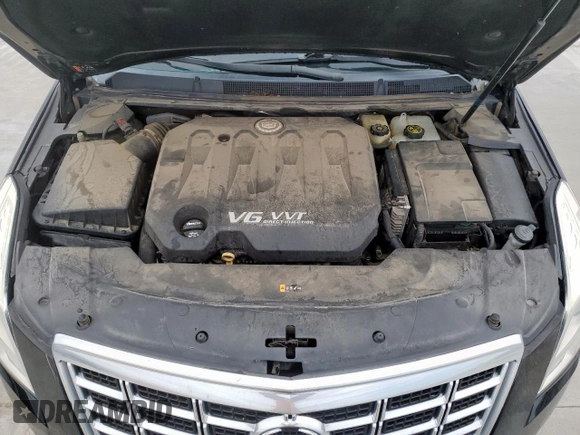 2014 Cadillac XTS Luxury z VIN 2G61M5S34E9315607, wystawiony jako Copart lot #58578595 z przebiegiem Nie podano mil oraz Szkoda całkowita • Salvage title. Historia ofert i sprzedaży dostępna na DreamBid. Obrazek 11.