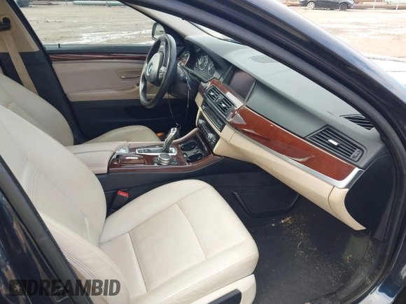 2015 BMW 5 Series 535i with VIN WBA5B1C58FG127959, listed as a IAAI auction lot 41571017 with 122,274 mi miles and . Bid and sale history available at carsss.com. Image 5.