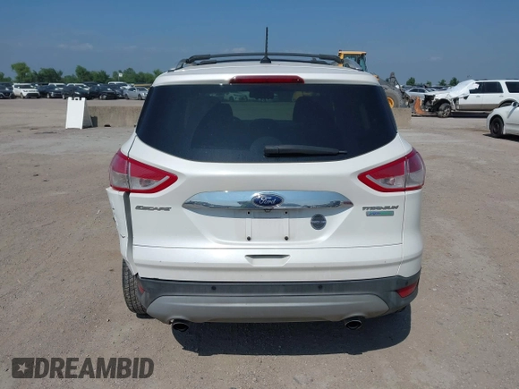 2015 Ford Escape Titanium with VIN 1FMCU0JX4FUB07322, listed as a IAAI auction lot 42220345 with 184,852 mi miles and . Bid and sale history available at DreamBid. Image 16.