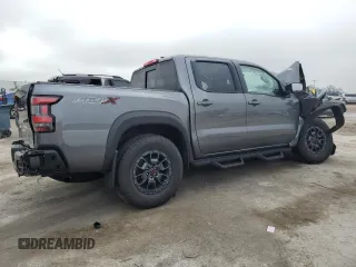 2024 Nissan Frontier Pro-X z VIN 1N6ED1EJ2RN605409, wystawiony jako Copart lot #85559674 z przebiegiem 6 850 mil mil oraz Nie do naprawy • Non repairable. Historia ofert i sprzedaży dostępna na DreamBid. Obrazek 3.
