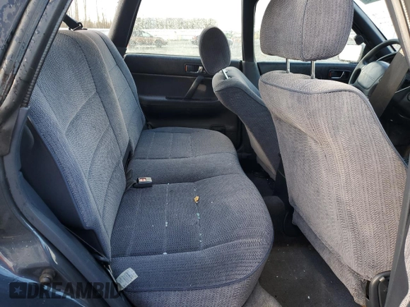 1993 Subaru Legacy L with VIN 4S3BJ6331P7949959, listed as a Copart auction lot 88360485 with 125,562 mi miles and Salvage Title. Bid and sale history available at DreamBid. Image 11.
