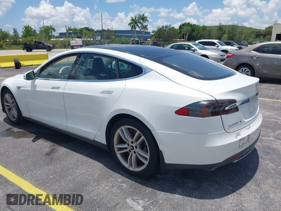 2013 Tesla Model S with VIN 5YJSA1CG4DFP21658, listed as a IAAI auction lot 42398609 with 116,068 mi miles and . Bid and sale history available at DreamBid. Image 3.