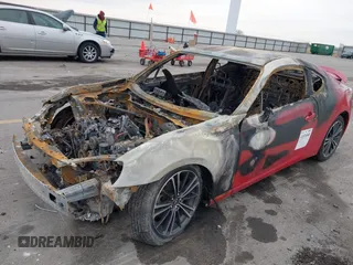 2014 Scion FR-S z VIN JF1ZNAA11E9706747, wystawiony jako IAAI lot #41076540 z przebiegiem Nie podano mil oraz . Historia ofert i sprzedaży dostępna na DreamBid. Obrazek 16.